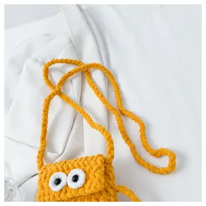 Handmade crochet cute big eye phone bag detail, yellow knit crossbody bag for women.