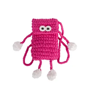 Handmade pink knit crochet mobile phone bag detail, cute big eyes design with white pom poms.