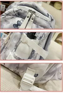 Rucksack Detailansicht mit glatten Reißverschlüssen, Seitentaschen und stabilem Schnallengurt.