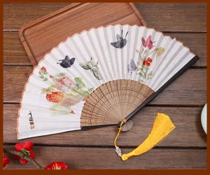 Traditional Chinese folding fan with floral butterfly pattern, linen fabric and wooden ribs.