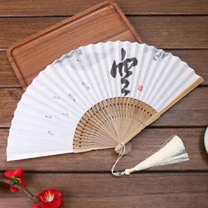 Retro linen folding fan with calligraphy design and tassel, perfect for dance and photo props.
