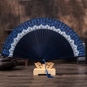 Traditional Chinese folding fan with lace floral print, elegant wood handle and blue tassel.