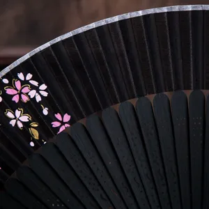Japanese style folding fan with black fabric and cherry blossom pattern for daily use