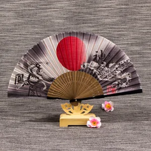 Traditional Chinese style folding silk fan with wooden stand, elegant dragon and phoenix art.