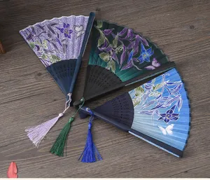 Chinese style folding hand fan with silk fabric and wooden ribs, ideal for dancing performance.