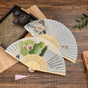 Chinese vintage style folding fan with lotus painting and bamboo handle for summer.
