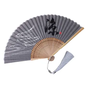 Vintage Chinese folding fan with linen fabric, bamboo ribs and elegant tassel for dance and gifts.