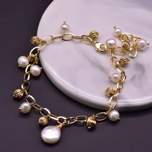 Exquisite gold-plated chain bracelet featuring natural freshwater pearls and textured metal beads.