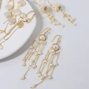 Orecchini pendenti con perle d'acqua dolce per donne, eleganti gioielli vintage dorati.