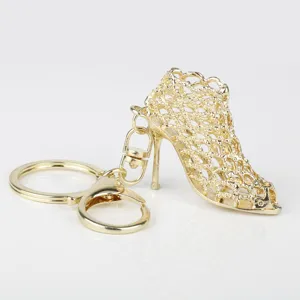 Metal high heel shoe keychain, stylish hollow gold keyring charm for bags and car keys.