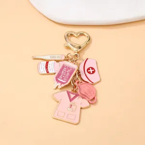 Pink medical nurse theme metal keychain pendant with cute thermometer, pill and scrub charms.
