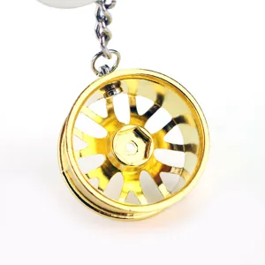 Mini portachiavi cerchione auto dorato accessorio metallico ciondolo regalo chic