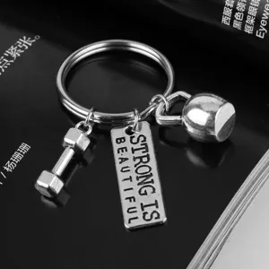 Portachiavi fitness con ciondoli manubrio e kettlebell, accessorio anello in metallo.