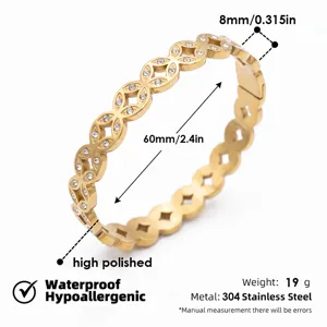 Brazalete de trébol de acero inoxidable dorado con pedrería, ancho de 8mm, peso de 19g.