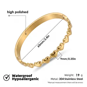 Brazalete rígido de acero inoxidable dorado con corazones impermeable hipoalergénico