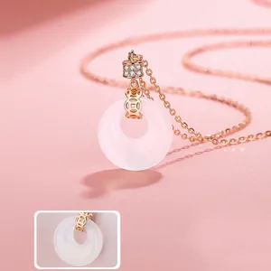 Detail view of S925 sterling silver white chalcedony safety buckle pendant necklace closeup.