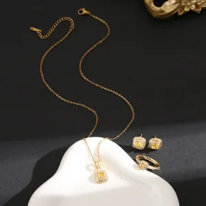 Vista detallada del juego de joyas de cristal cuadrado amarillo collar pendientes anillo.
