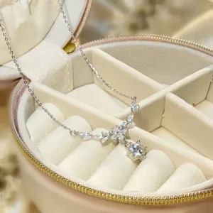 Detail view of the elegant sterling silver zircon floral wheat necklace, delicate clavicle chain.