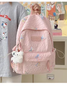 Rosa Studenten Rucksack mit schöner Schmetterlingsstickerei und Plüsch Bär Anhänger.