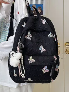 Schwarzer gesteppter Rucksack mit bunten Schmetterlings-Stickereien, großer Schulrucksack.