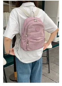 Sac à dos décontracté en nylon pour femme cartable élégant multi poches voyage rose
