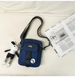 Bolso cruzado informal de lona para hombre, bolso diario con un bonito colgante de conejo.