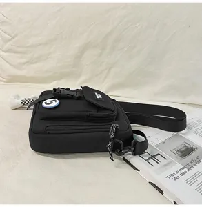 Bolso cruzado de lona negra plano de detalle, bolso bandolera casual para teléfono.