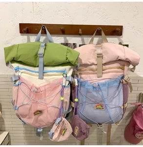 Fresh college style roll-top backpack with large capacity and multi-pocket design for students.