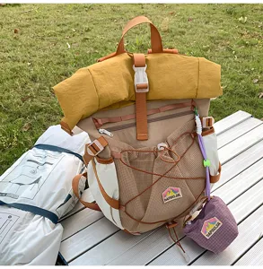 Roll-top canvas student backpack large capacity casual college style travel daypack bag.