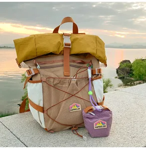 Roll top large capacity college style student backpack with matching small pouch outdoor bag.