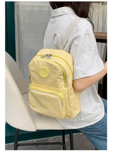 Sac à dos d'école en nylon jaune décontracté pour femmes, grand sac de voyage quotidien élégant.