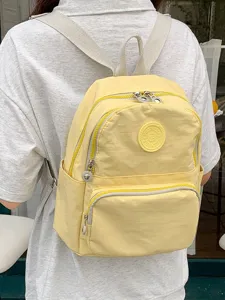 Sac à dos en nylon jaune clair sac d'école étudiant décontracté avec poches zippées spacieux