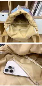 Detailed view of the student backpack interior with zipper pocket and large capacity.