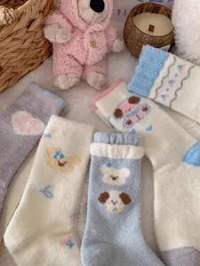 Cozy thick autumn winter fleece socks for women featuring cute cartoon dog and heart patterns.