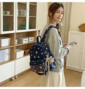 Mochila informal con estampado de estrellas para estudiantes, elegante bolsa escolar con bolsillo.