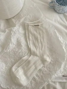 Women's white hollow-out mid-tube cotton socks with cute rolled edge and letter fabric label design