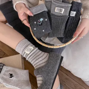 Grey thick warm wool winter socks with cute cat embroidery and woven label details.