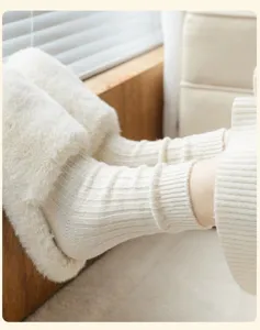 Cozy ribbed knit plush wool socks detail, soft warm winter crew socks in home lifestyle shot.