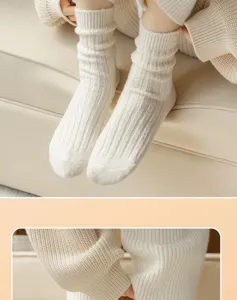 Detail shot of thick warm wool slouch socks in soft ribbed knit, comfortable winter hosiery.
