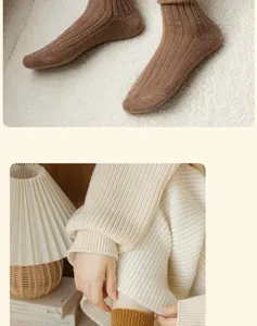 Close-up detail shot of cozy wool ribbed mid-tube socks in warm brown, soft knit texture.