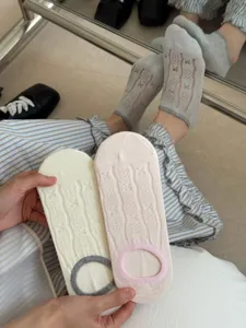 Close-up detail of summer women shallow-mouth bow knit boat socks breathable invisible socks