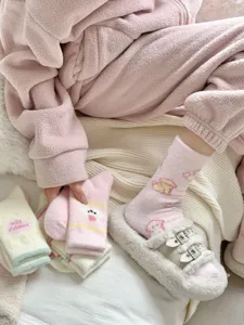 Cozy fleece winter socks for women, thick warm cute cartoon plush sleep socks for home.
