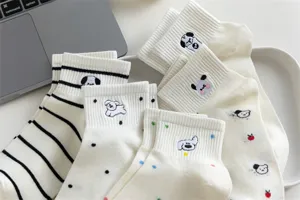 Detailed view of cute cartoon embroidered cotton short socks, breathable summer women boat socks.