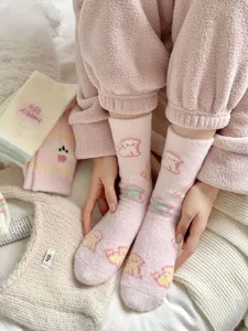 Cozy winter plush mid-tube fuzzy socks for women, thick warm sleep socks in soft pink.