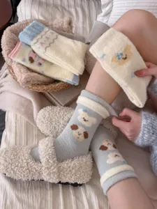 Thickened cute cartoon dog plush sleep socks for women, cozy winter thermal floor socks.