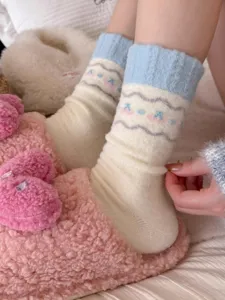 Cozy winter fleece socks for women, cute cartoon dog pattern, thickened warm fluffy sleep socks.