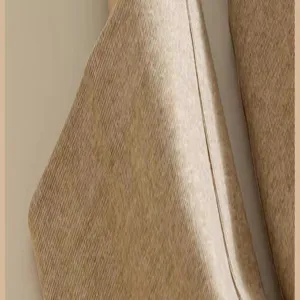 Detalle macro de tejido de calcetín térmico grueso, textura suave para invierno frío.