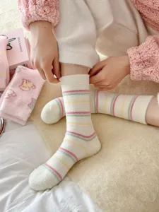 Cozy fuzzy winter women warm socks with cute pastel stripes soft plush sleep socks daily wear