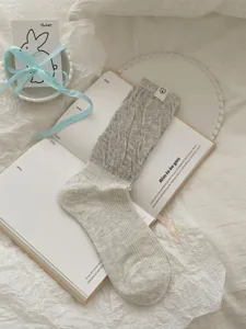 Women's cute stackable mid-tube knit socks in light gray, comfortable and stylish daily wear.