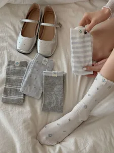Women mid-calf socks and silver flat shoes set, cute patterned cotton socks for daily wear.